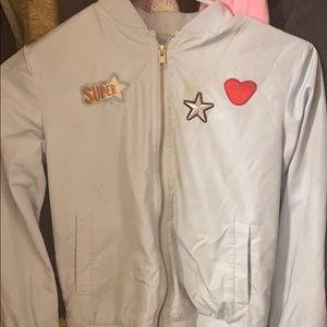 light blue patched windbreakers no hood